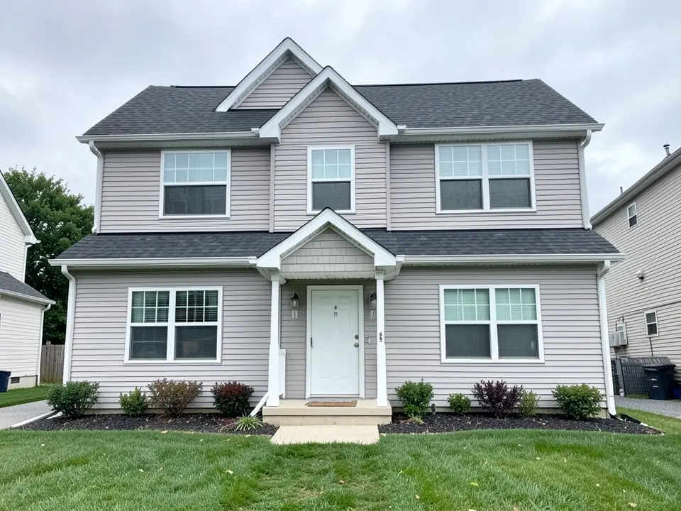 AI-drawn generic stand-in of a two-story house with light gray horizontal vinyl siding, white trim, a small gabled porch roof over a white front door and a dark gray shingle roof