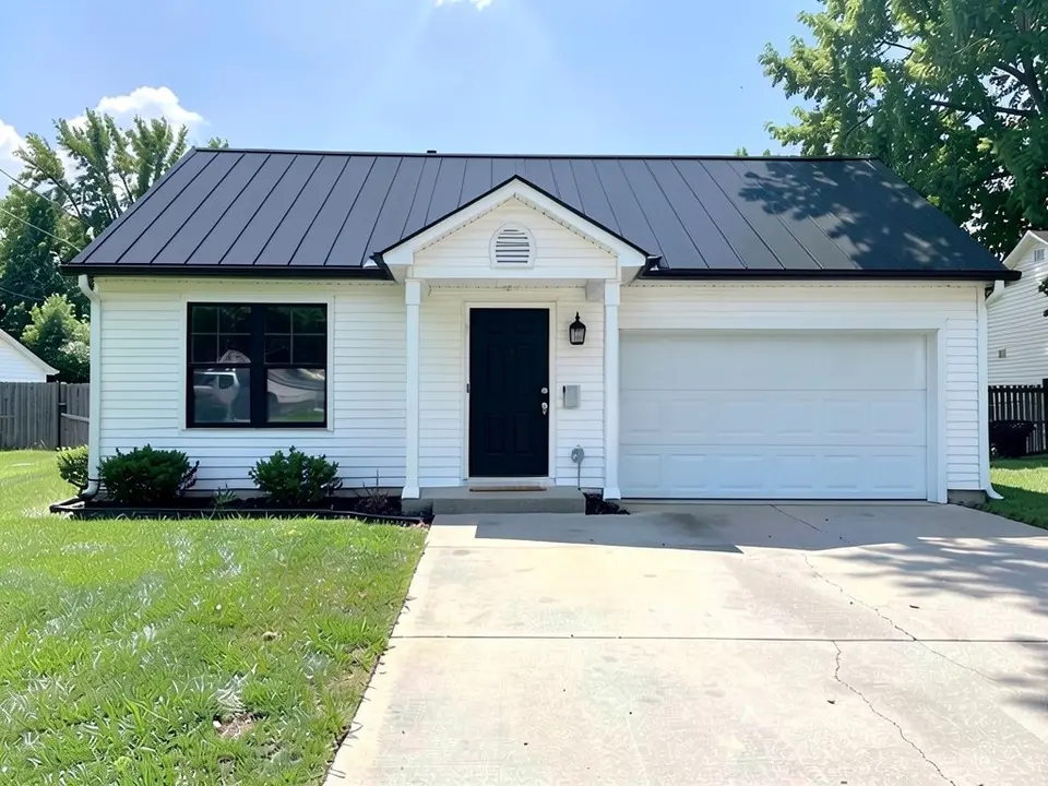 The same house with a matte black standing seam metal roof; walls, door, window and garage door kept