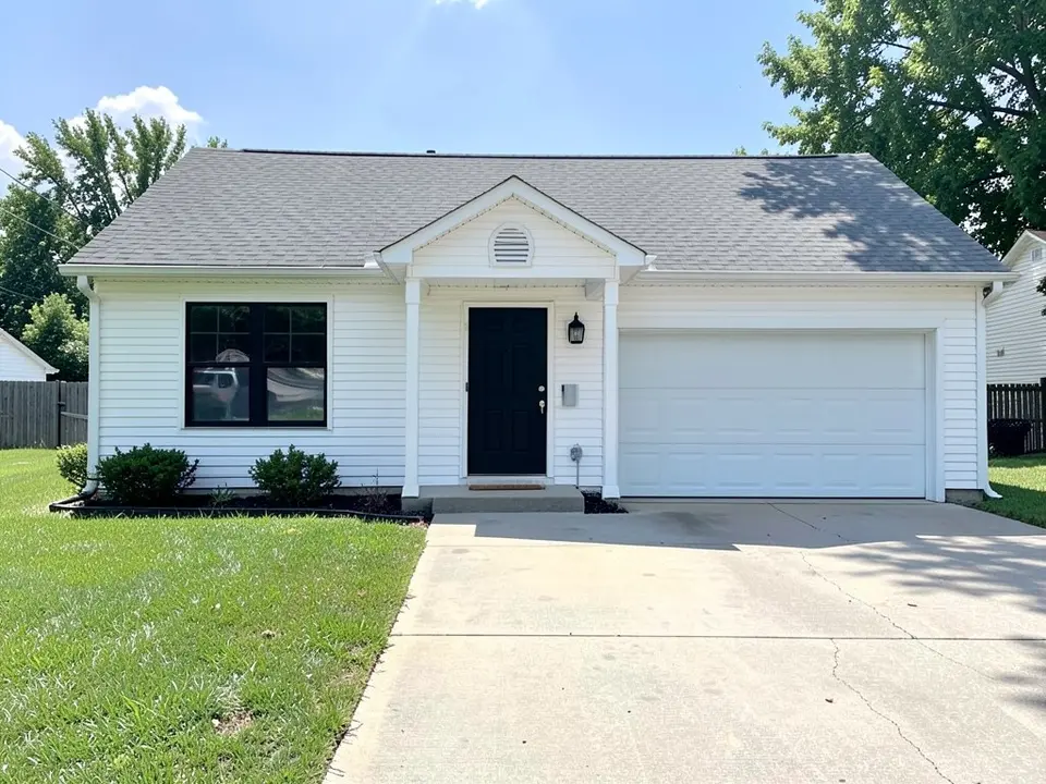 AI-drawn generic stand-in of a one-story white ranch house with an attached garage, a black front door, a black-framed window and a gray asphalt shingle roof