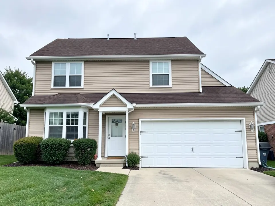 AI-drawn generic stand-in of a two-story suburban house with tan horizontal vinyl siding, white trim, a small gabled entry roof over a white door, a two-car garage with a white door and a dark brown shingle roof