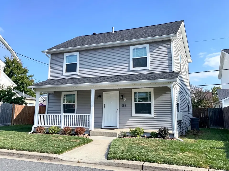 AI-drawn generic stand-in of a two-story house with pale gray horizontal siding, white trim and window frames, a white front door and a covered porch with white posts and railing