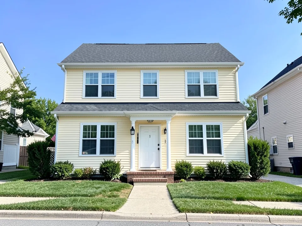 AI-drawn generic stand-in of a two-story colonial-style house with soft butter yellow siding, white trim, a white front door, no shutters and a dark gray roof